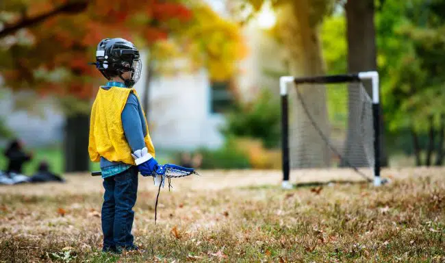 kid playing lacrosse