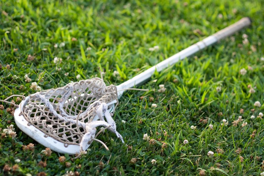 lacrosse stick on grass