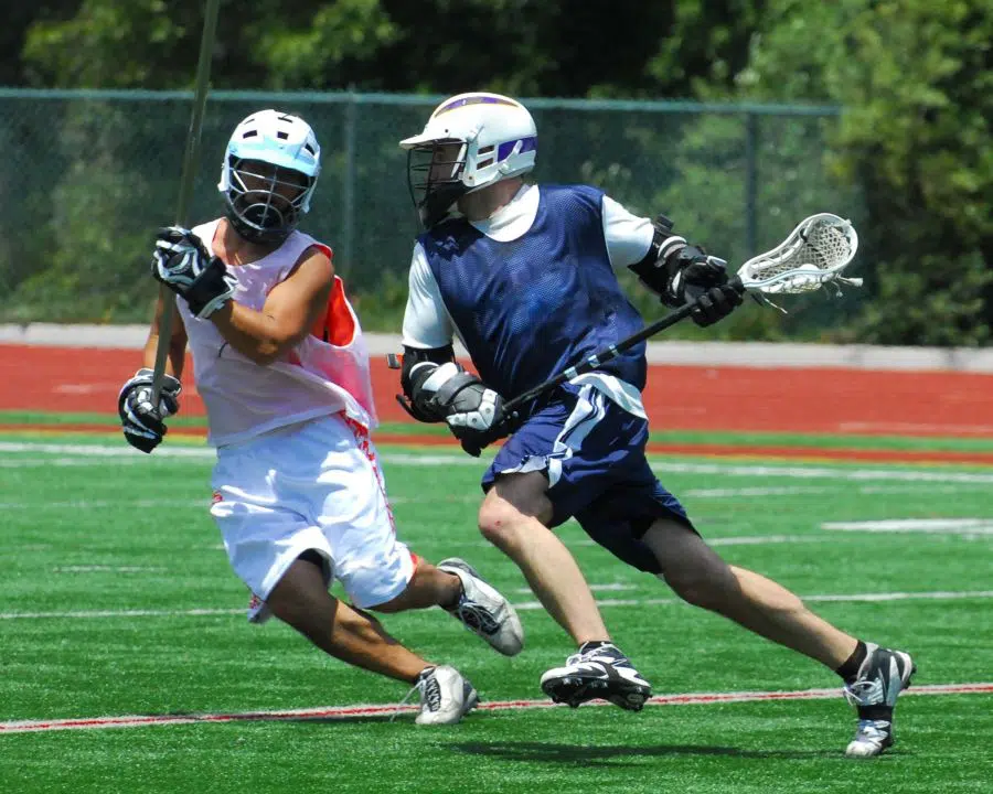 lacrosse midfielders during a match
